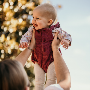 baby wearing cream merino wool cable tights nz