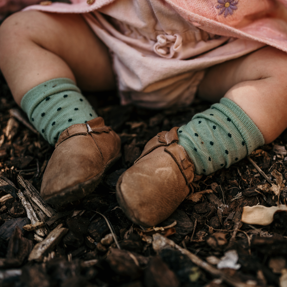 baby wearing green crew socks merino wool nz