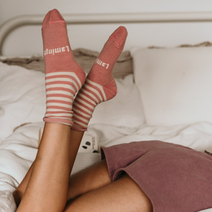 woman wearing merino wool pink crew socks striped nz