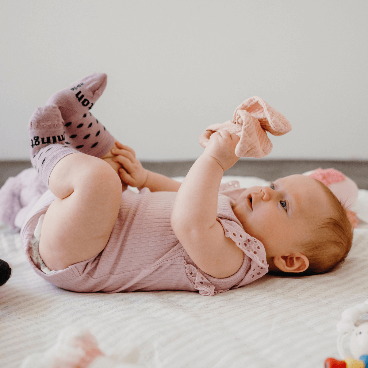 Lilac with dark green spots merino wool baby crew socks by Lamington NZ