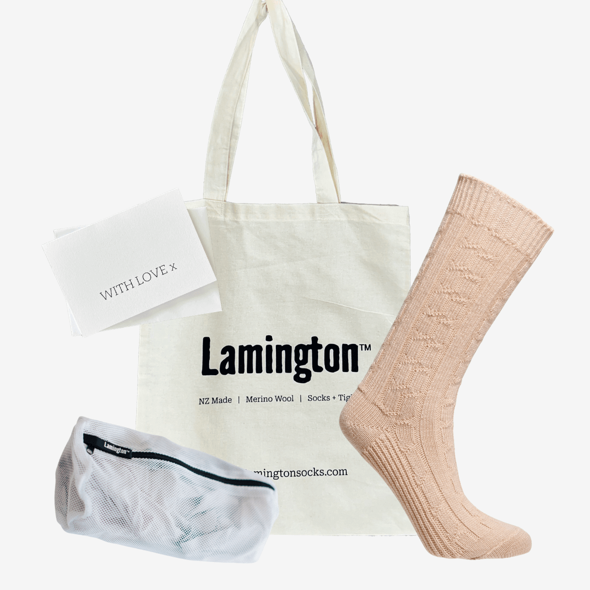 womens plush cable patterned merino lounge socks in sand colour with tote and laundry bag